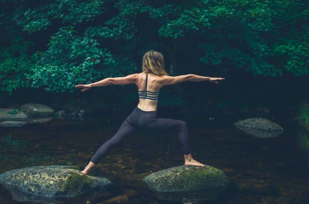 yoga woman in warrior pose