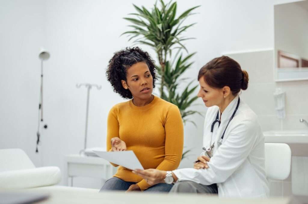 young woman consulting a doctor